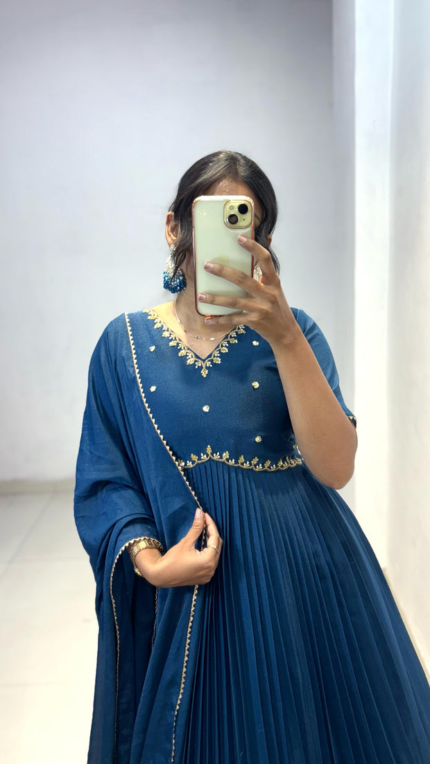 Look at our morpinchh color full length dress with hand embroidered neckline