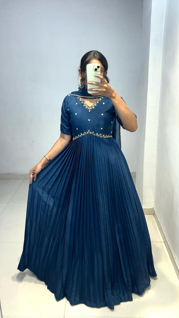 Look at our morpinchh color full length dress with hand embroidered neckline