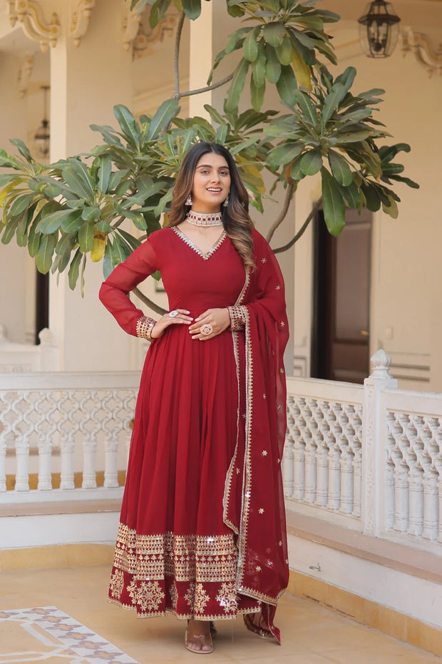 Outstanding Sequins Embroidered Multi-Sequins work Maroon Color Gown