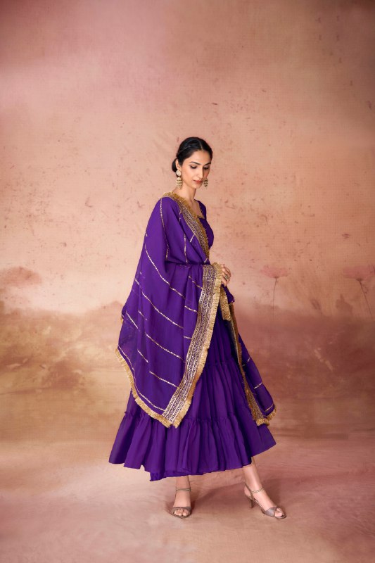 Steal the spotlight in this 16-meter flair ruffle gown