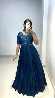 Look at our morpinchh color full length dress with hand embroidered neckline