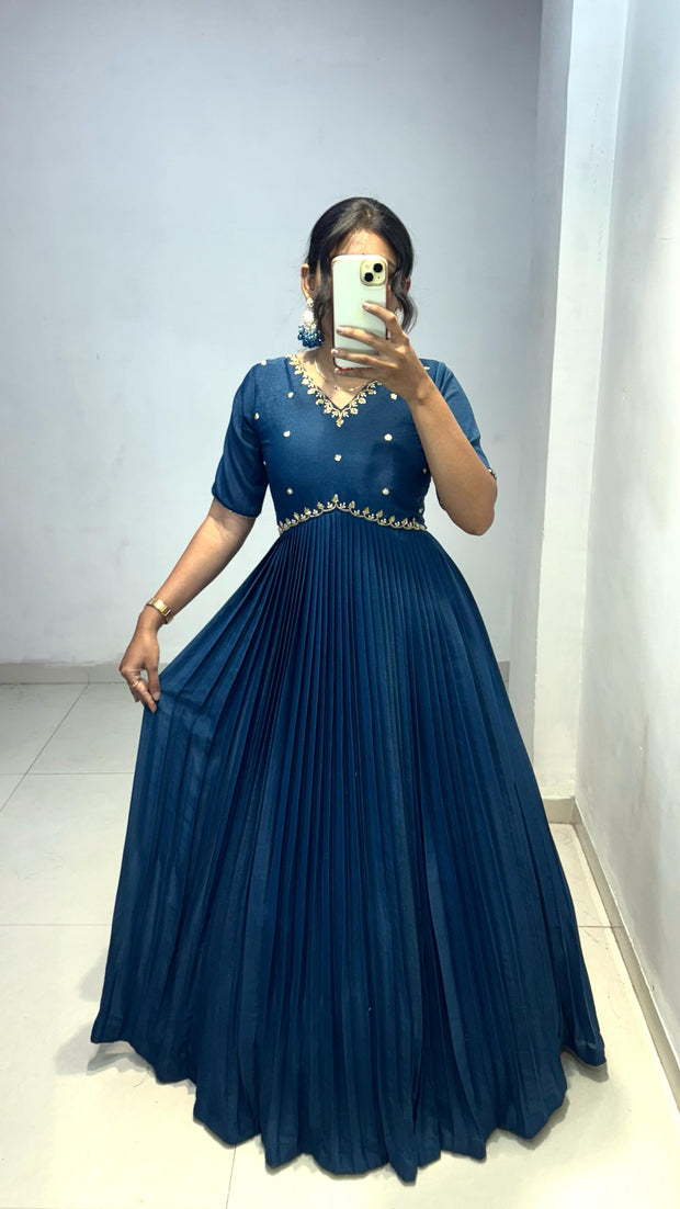 Look at our morpinchh color full length dress with hand embroidered neckline