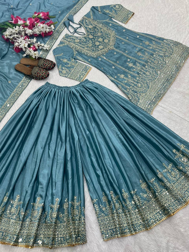 Flattering Sky Blue Color Heavy Work Sharara Suit