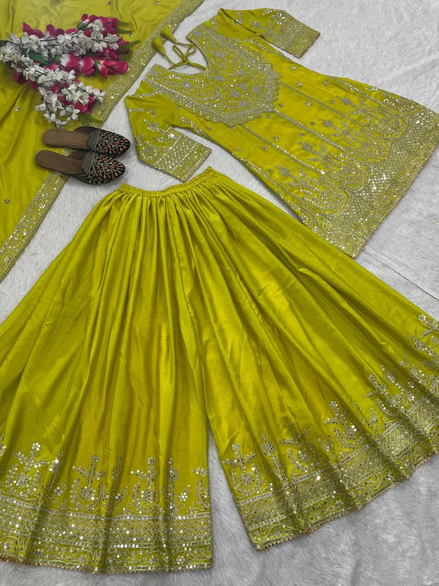 Flattering Yellow Color Heavy Work Sharara Suit
