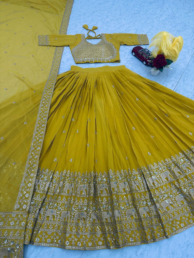 Bridal Wear Heavy Work Mustard Color Lehenga Choli